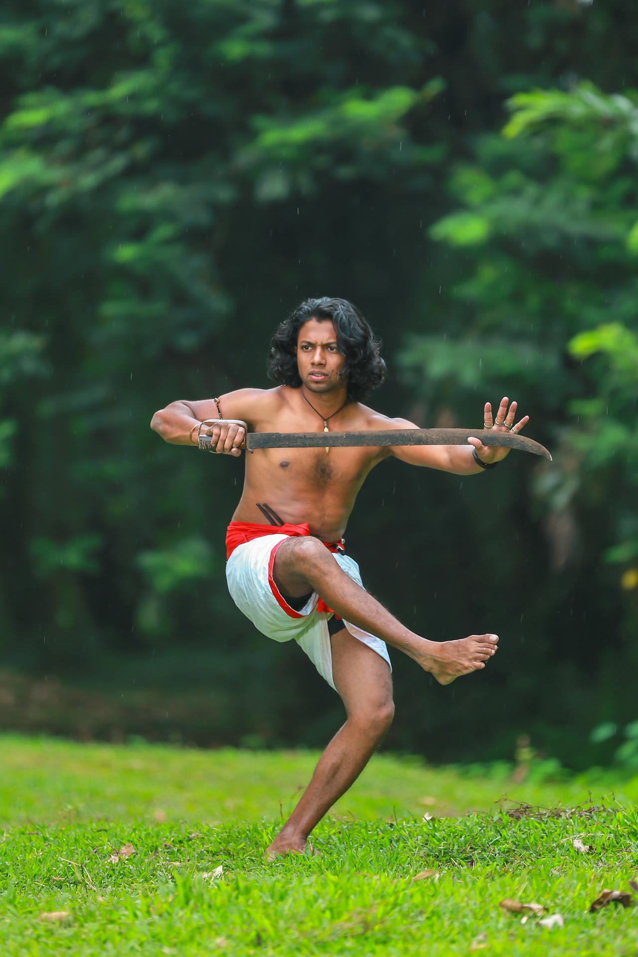 Kalaripayattu warrior in traditional training stance